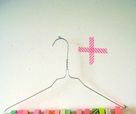 Wire hanger washi tape organizer