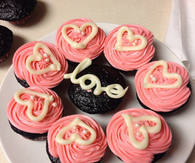 Chocolate cupcakes with pink frosting