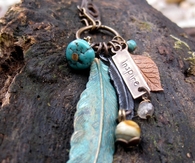Feather charms