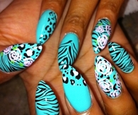 Animal print teal stiletto nails