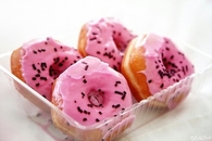 Pink sprinkled donuts