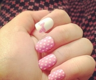 Polka dot bow nails
