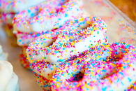 Sprinkle chocolate pretzels