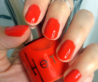 Glossy red nails